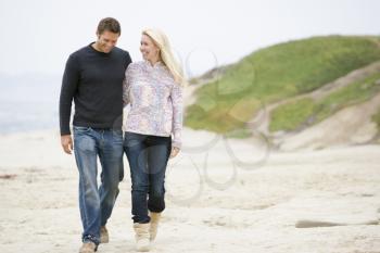 Royalty Free Photo of a Couple Walking on the Beach