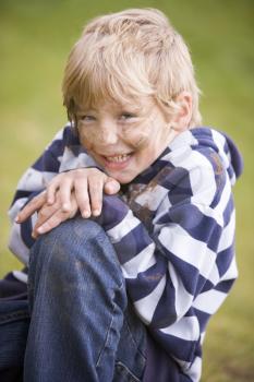 Royalty Free Photo of a Little Boy With a Dirty Face