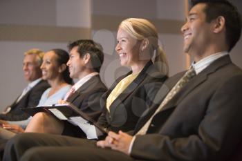 Royalty Free Photo of People Listening to a Presentation