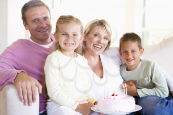 Royalty Free Photo of a Family With Birthday Cake
