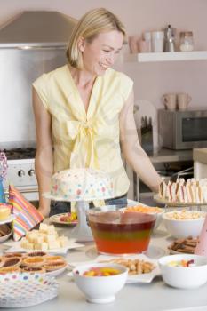 Royalty Free Photo of a Woman With Party Food