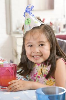 Royalty Free Photo of a Little Girl at a Birthday Party