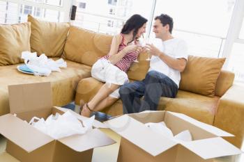 Royalty Free Photo of a Couple Relaxing With Champagne