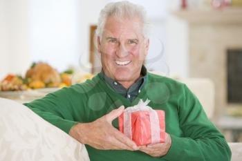 Royalty Free Photo of a Man With a Gift