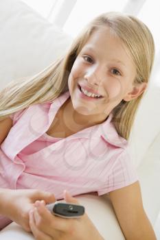 Royalty Free Photo of a Young Girl With a Cellphone