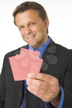 Royalty Free Photo of a Man With Cards