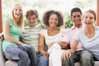 Royalty Free Photo of a Group of Teens on a Couch