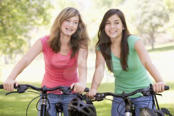 Royalty Free Photo of Girls on Bikes