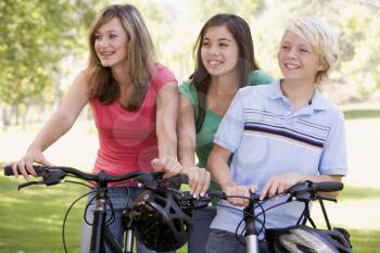 Royalty Free Photo of Teens on Bikes