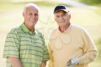 Royalty Free Photo of Two Men Golfing