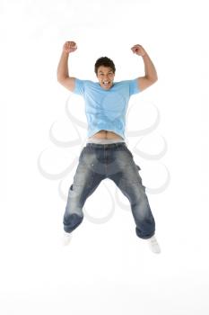 Royalty Free Photo of a Teenager Jumping in the Air