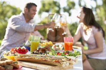 Royalty Free Photo of a Couple Dining Outside