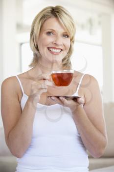 Royalty Free Photo of a Woman With a Cup of Tea