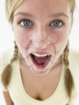 Royalty Free Photo of a Teenage Girl Looking Shocked