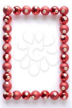 Border Made From Red Baubles Against White Background