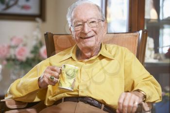 Royalty Free Photo of a Man Drinking Tea
