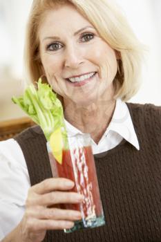 Royalty Free Photo of a Woman With a Bloody Mary