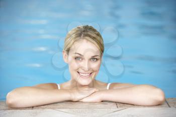 Royalty Free Photo of a Young Woman in a Pool