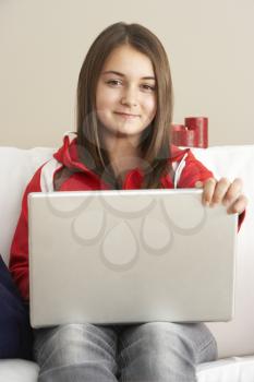 Royalty Free Photo of a Girl With a Laptop