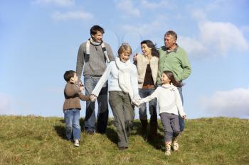 Royalty Free Photo of a Family Walking in a Park