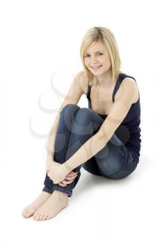 Teenage Girl Sitting In Studio