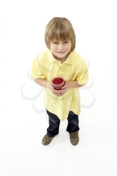 Royalty Free Photo of a Little Boy Holding a Glass of Juice