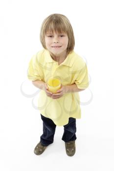 Royalty Free Photo of a Little Boy With Juice