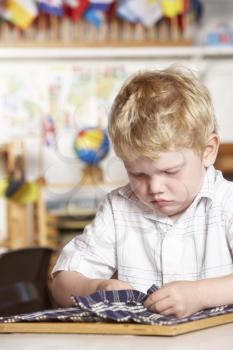 Royalty Free Photo of a Little Boy at Preschool