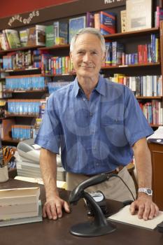 Royalty Free Photo of a Man in a Bookshop