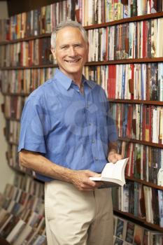 Royalty Free Photo of a Man in a Bookshop