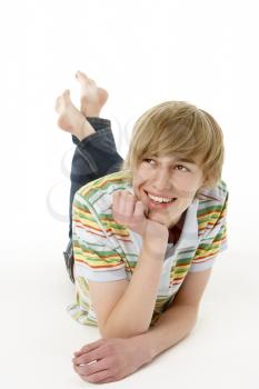 Royalty Free Photo of a Guy Lying on the Floor