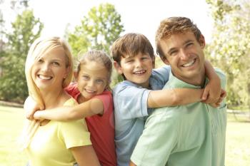 Royalty Free Photo of Parents and Children Outside