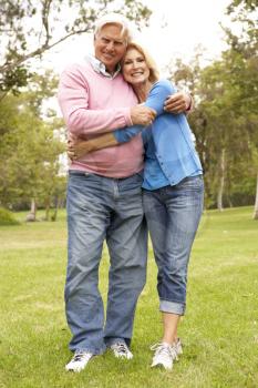 Royalty Free Photo of a Couple Walking in the Park