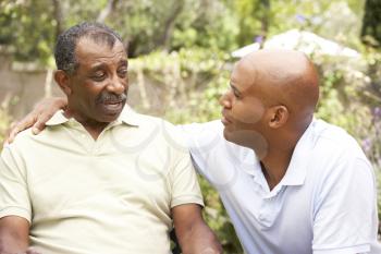 Royalty Free Photo of a Father and Son Outside