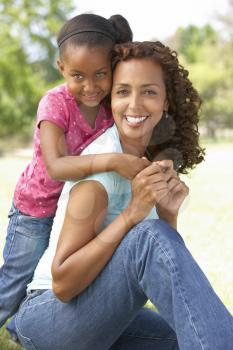 Portrait Of Mother And Daughter In Park