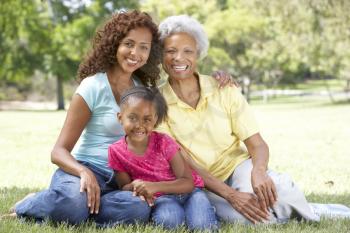 Grandmother With Daughter And Granddaughter In Park