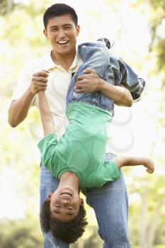 Father With Son In Park