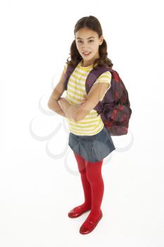 Studio Portrait Of Young Girl With Backpack