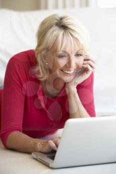 Middle age woman on her laptop computer