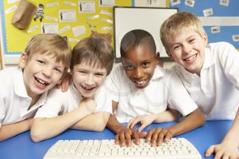 Schoolchildren in IT Class Using Computers