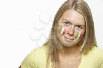 Young Female Sports Fan With Italian Flag Painted On Face