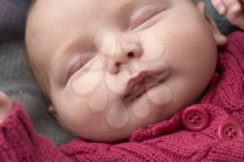 Portrait Of Sleeping Newborn Baby Girl