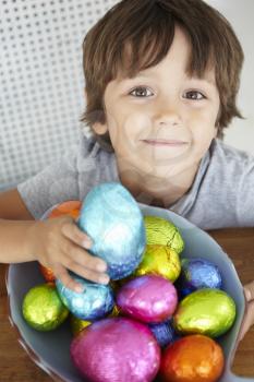 Child with Easter eggs