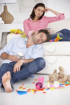 Exhausted parents resting