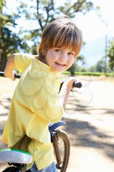 Little boy on country bike ride