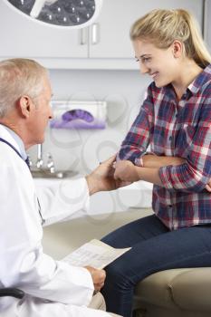 Teenage Girl Visits Doctor's Office With Elbow Pain