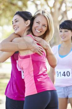 Female Runners Congratulating One Another After Race