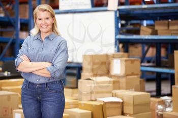 Portrait Of Worker In Distribution Warehouse