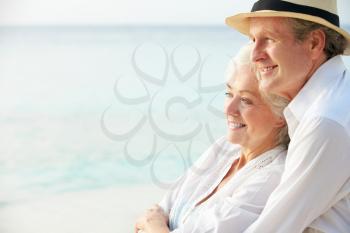 Affectionate Senior Couple On Tropical Beach Holiday