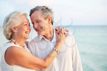 Senior Couple Getting Married In Beach Ceremony